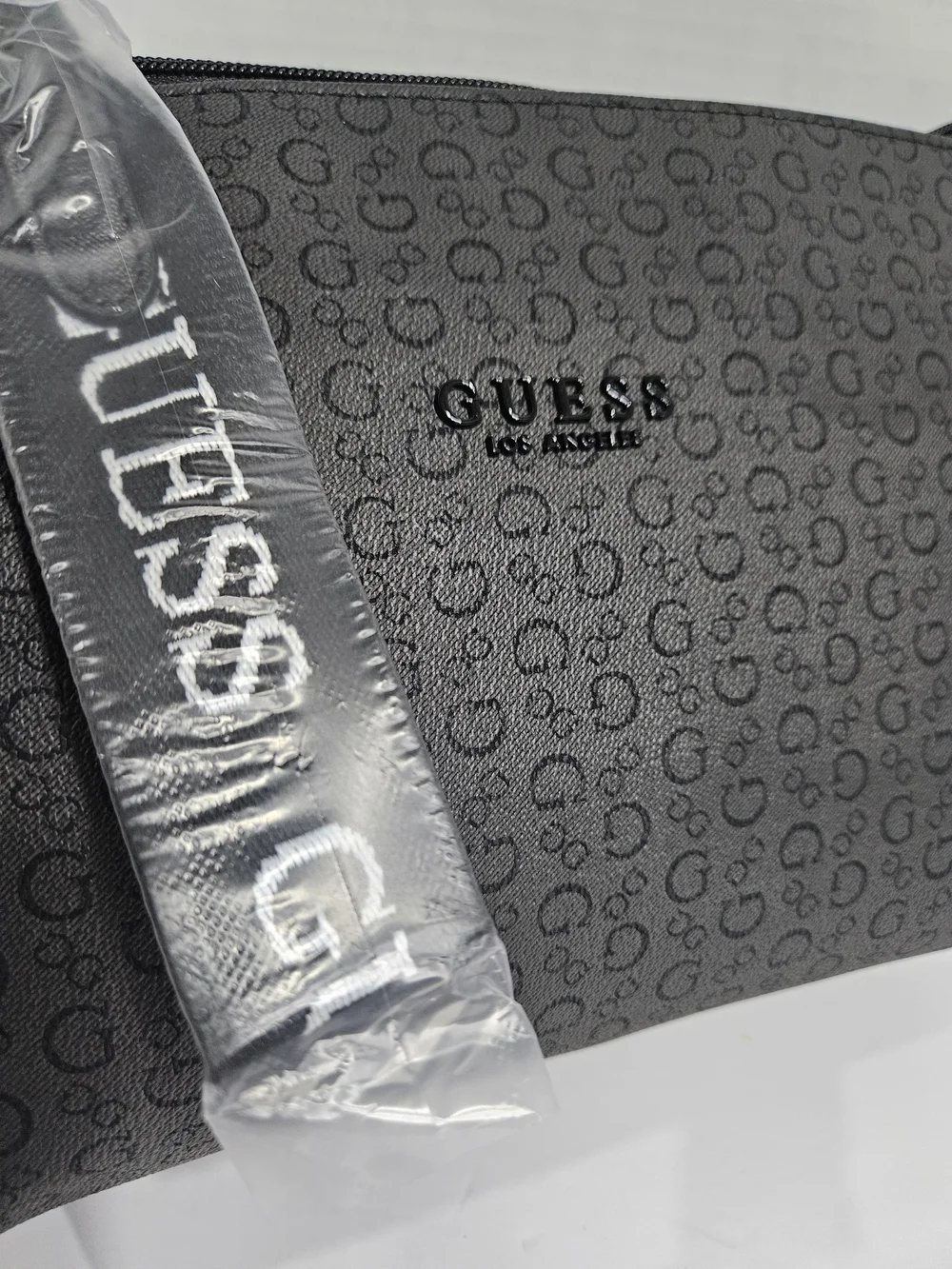 Guess men wristlet